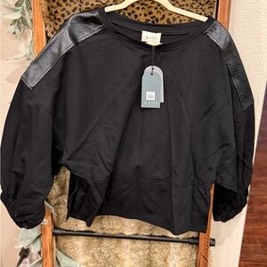 Black Pullover Top with Faux Leather Shoulder Panels